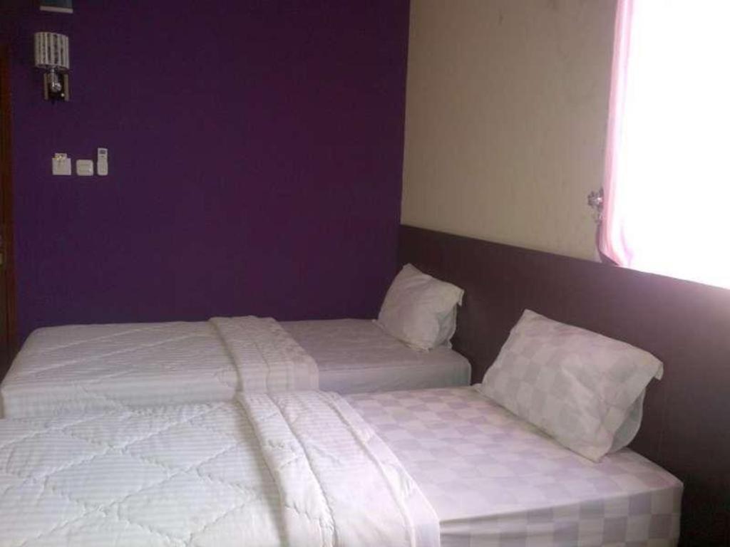 Erin Int Hotel มากาซาร์ ภายนอก รูปภาพ